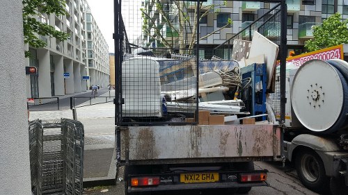 Bins filled with building waste ready for transport